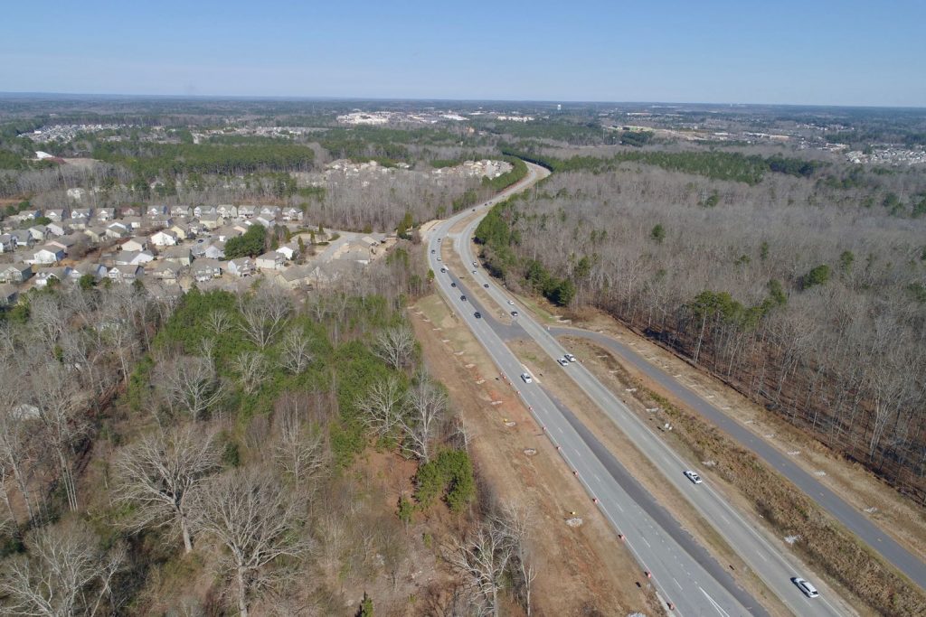 Aerial view of three land tracts for sale at Poplar Road and Newnan Crossing Bypass in Newnan, GA.