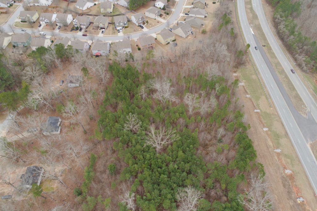Aerial view of three land tracts for sale at Poplar Road and Newnan Crossing Bypass in Newnan, GA.