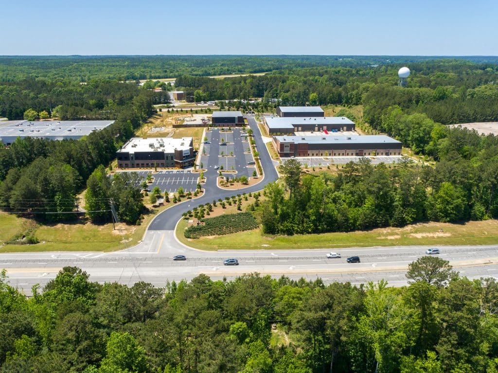Aerial view of five buildings in the South 74 Industrial Office complex in Peachtree City, GA.