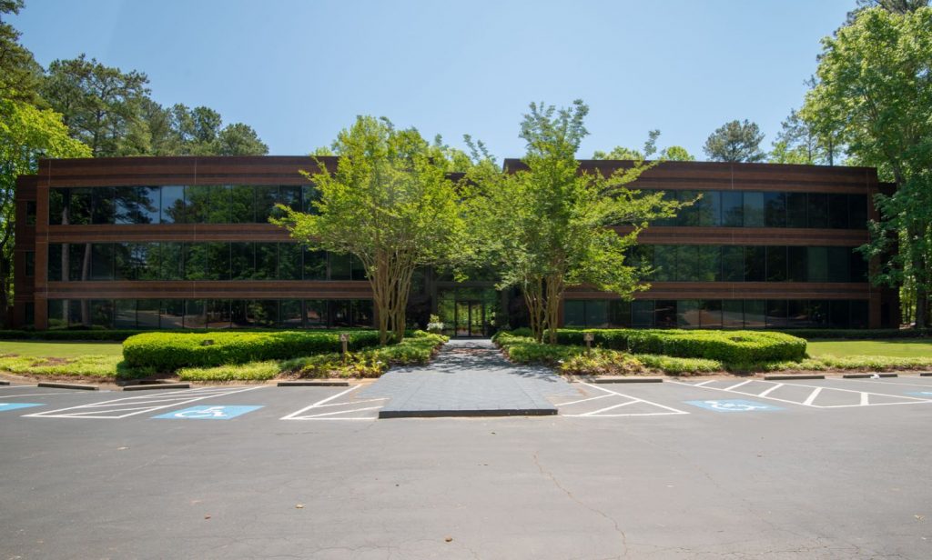 Exterior front view of the Brookside building for 200 Westpark Drive, Peachtree City, GA.