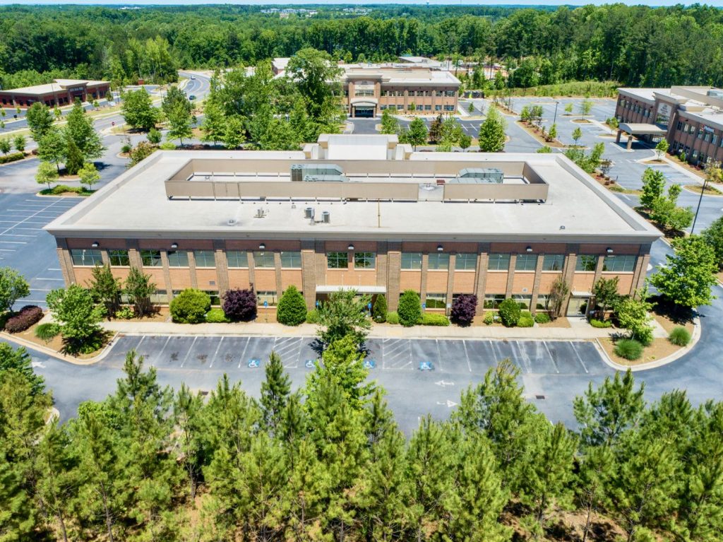 Aerial view of 2401 Newnan Crossing Blvd Medical Office Building and other buildings in the Newnan Professional Center in Newnan, GA.