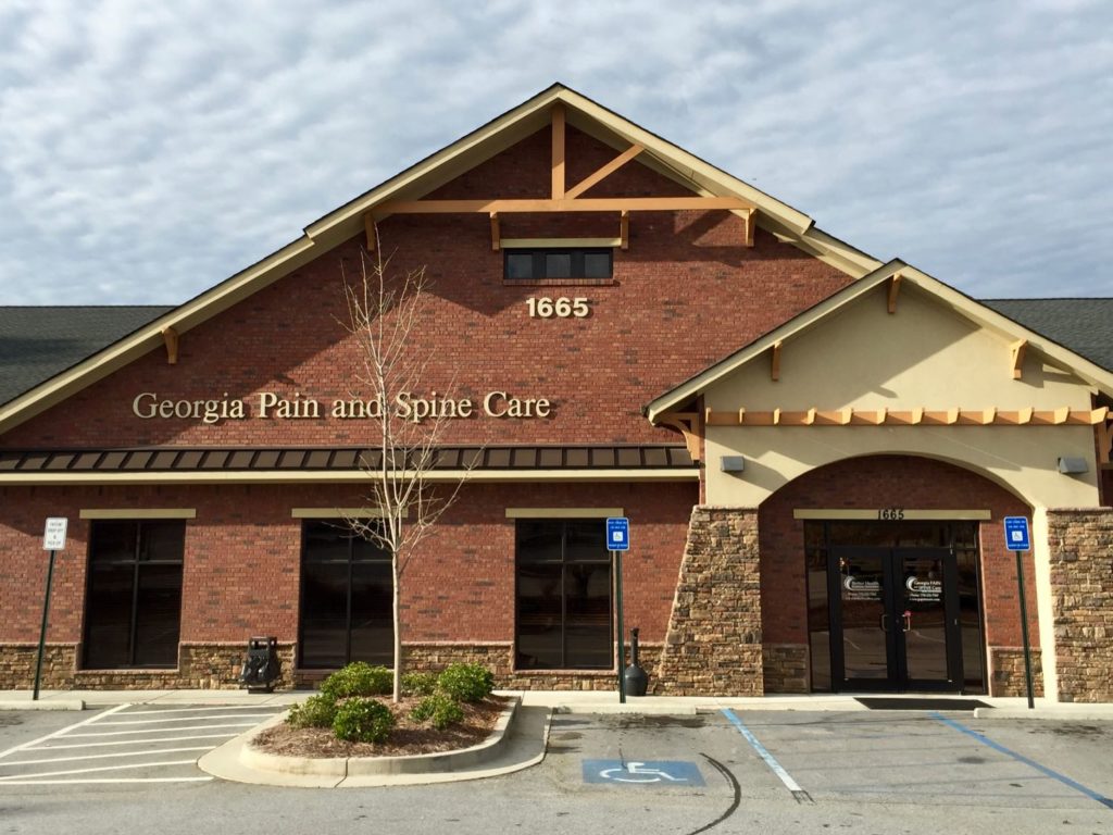 Exterior front view of the Georgia Pain and Spine Care brick building in Newnan, GA.