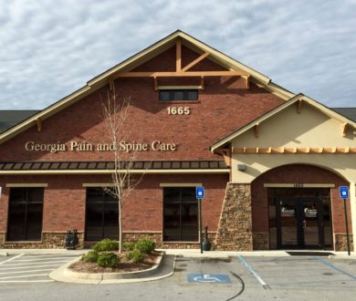 Exterior front view of the Georgia Pain and Spine Care brick building in Newnan, GA.
