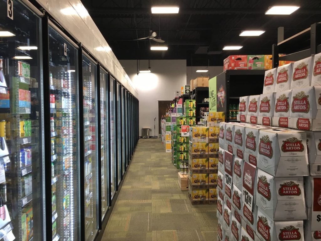 Interior aisle with refrigeration of World of Beverage, Peachtree City, GA.