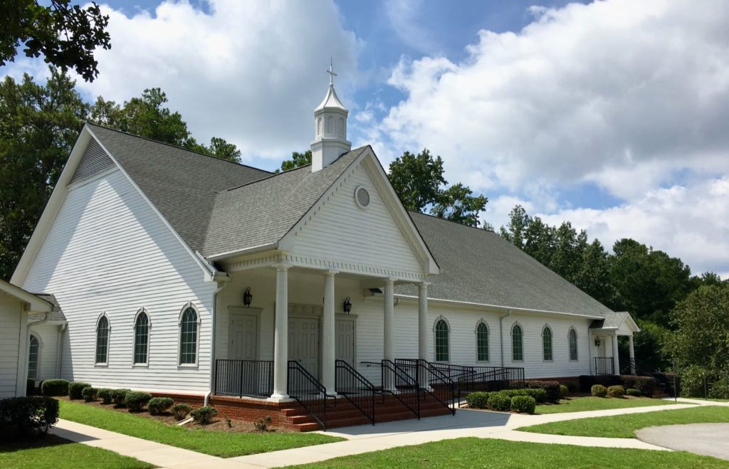Exterior view of sanctuary building for Sandy Creek Baptist Church of Fayetteville, GA.