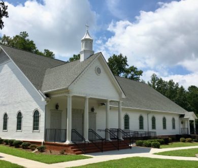 Exterior view of sanctuary building for Sandy Creek Baptist Church of Fayetteville, GA.