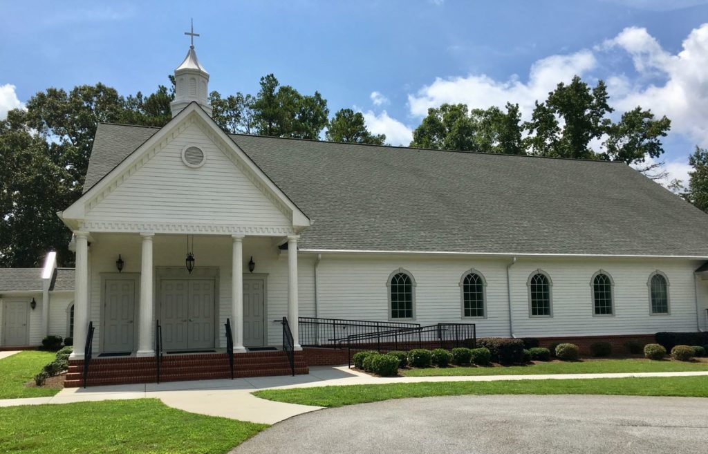 Exterior view of sanctuary building for Sandy Creek Baptist Church of Fayetteville, GA.