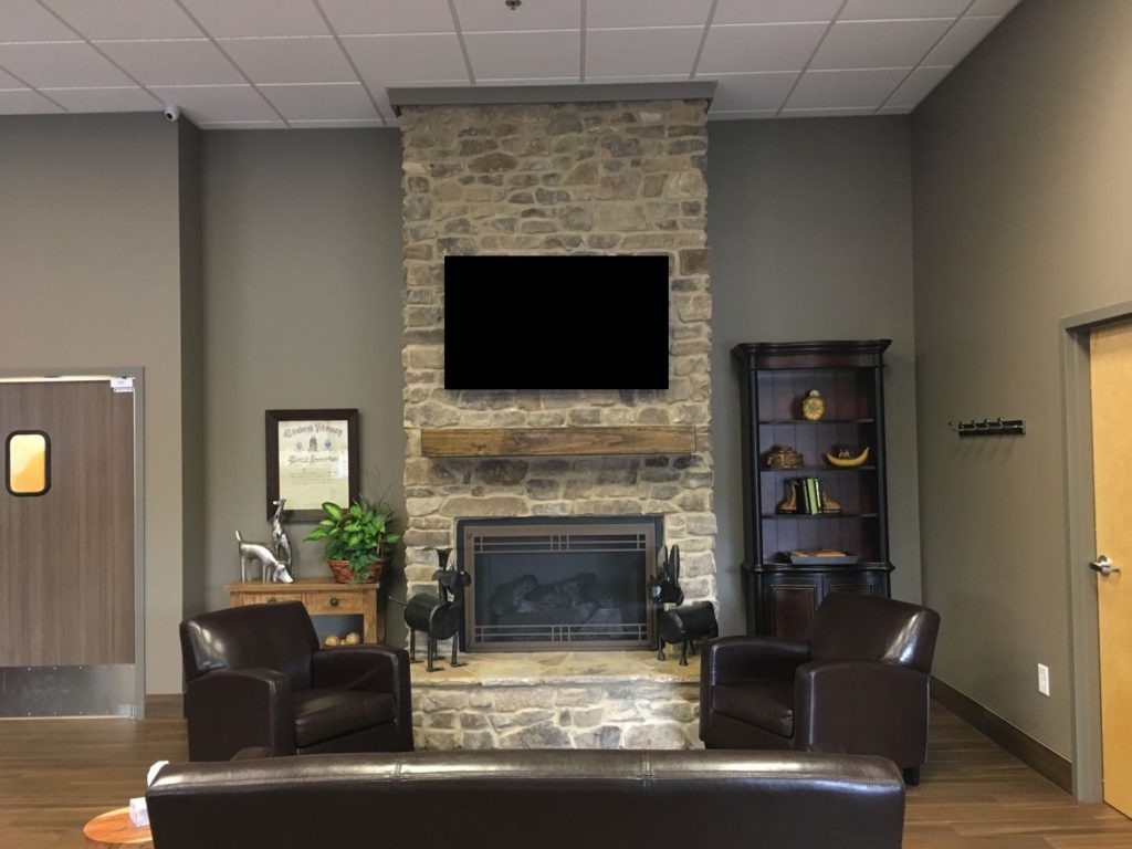 Beautiful stone fireplace inside the lobby of South Atlanta Veterinary Emergency and Specialty in Fayetteville, GA.