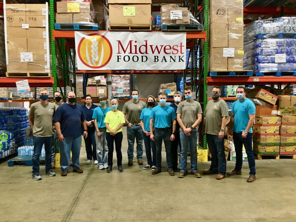 Southtree Commercial Construction Team volunteering at Midwest Food Bank in Peachtree City GA.